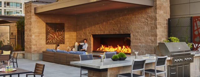 An outdoor fireplace makes for a comforting and relaxing environment! Contact Acucraft Today to Get Started Creating Your Own Custom Fireplace!