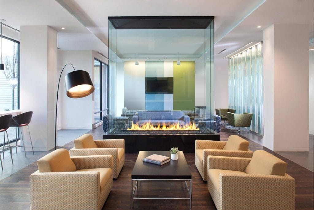 four sided gas fireplace glass fireplace in apartment lounge