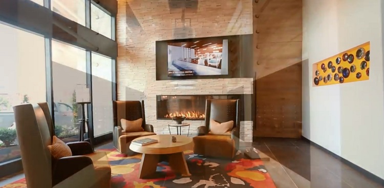 multi sided custom gas fireplace in lobby