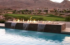 outdoor gas fire table with water feature in pool