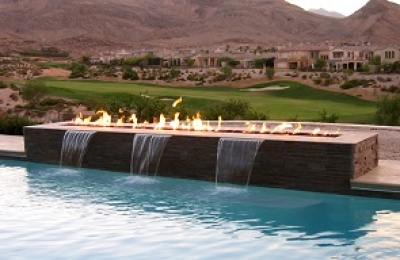 outdoor gas fire table with water feature in pool