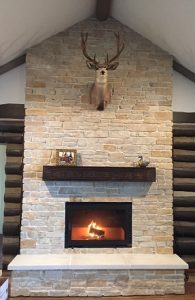 single sided wood burning fireplace with clean face in residential home