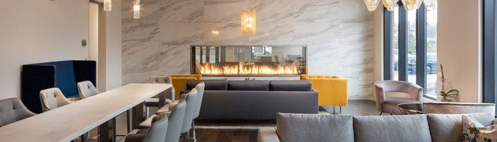 acucraft blaze see through linear gas fireplace at clarus maplewood apartments