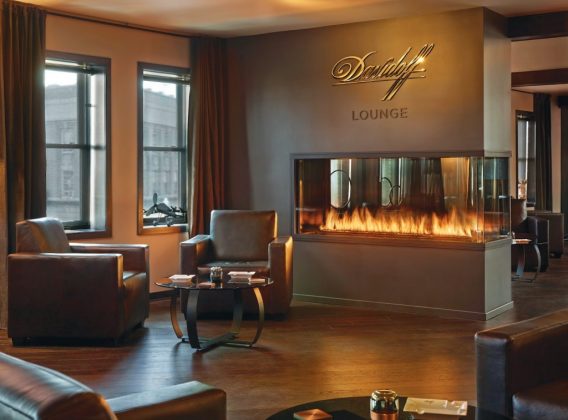 peninsula 3 sided custom gas fireplace in davidoff cigar lounge