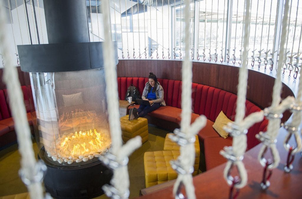 circular gas fireplace in sunken lounge at Google headquarters