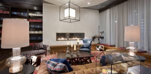 single sided linear gas fireplace in contemporary entertainment lounge
