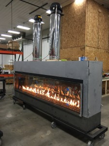 acucraft custom linear see through gas fireplace being tested