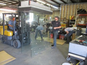 four sided glass for custom fireplace being manufactured