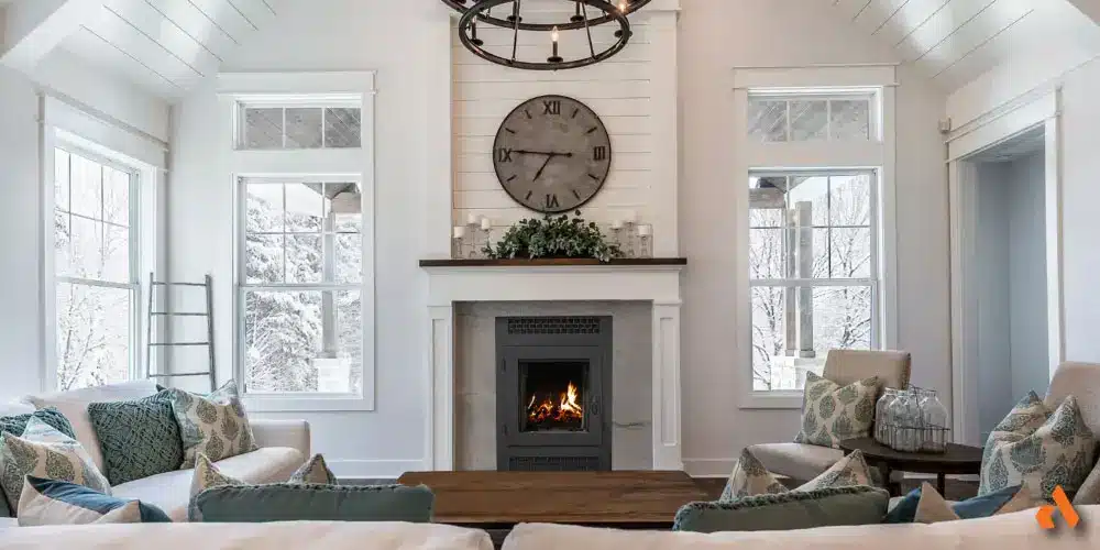 an image of a farmhouse style living room with a classic wood burning fireplace