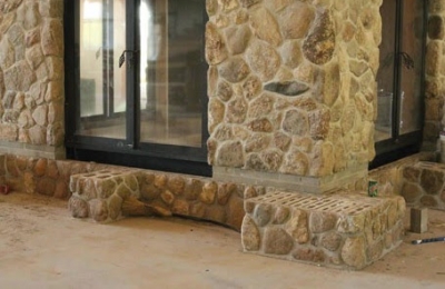 Photo of Acucraft's Largest Custom Wood Burning Fireplace Built for The Hermitage Club's Grand Room
