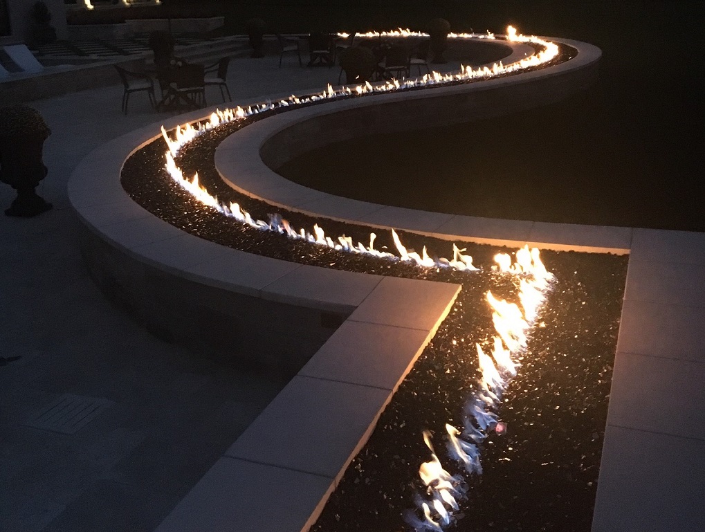 Custom 103' linear and curved burners outdoor residence