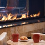 linear see through gas fireplace in hotel lobby