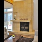 single sided wood burning fireplace with tile finish in living room