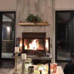 see through wood burning fireplace in living room