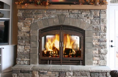 indoor outdoor see through wood burning fireplace