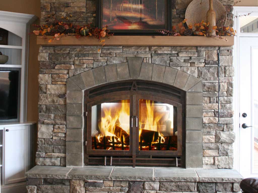 indoor outdoor see through wood burning fireplace