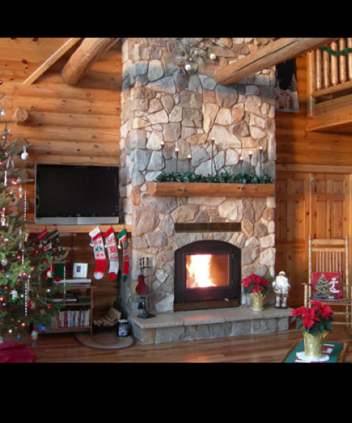 single sided wood burning fireplace with christmas tree