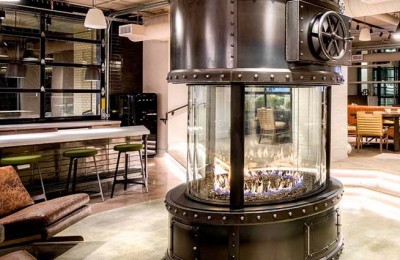 circular gas fireplace in apartment lounge