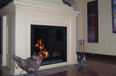 large see through wood burning fireplace in a private residence