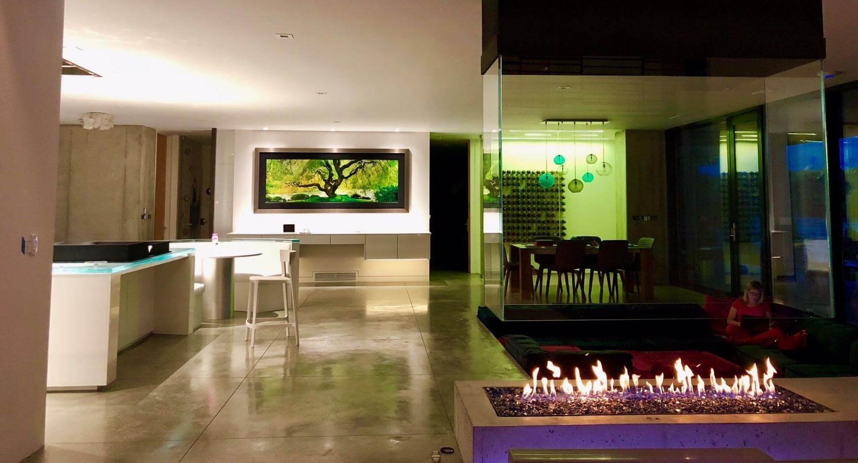 floor to ceiling glass fireplace