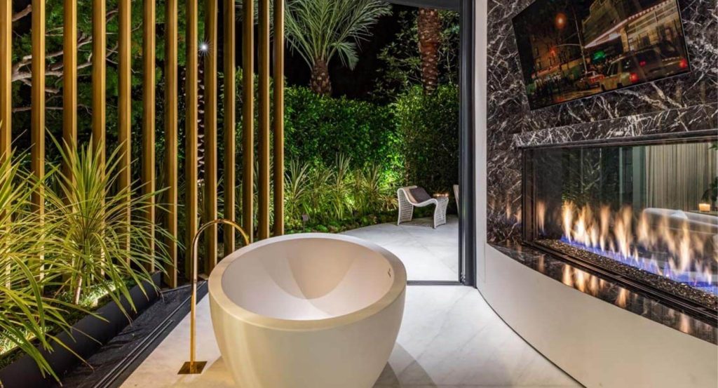 frameless fireplace in outdoor bath