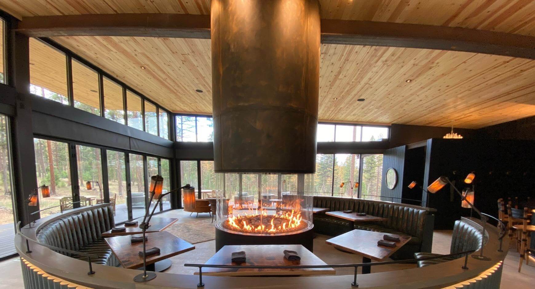 round fireplace with glass enclosure