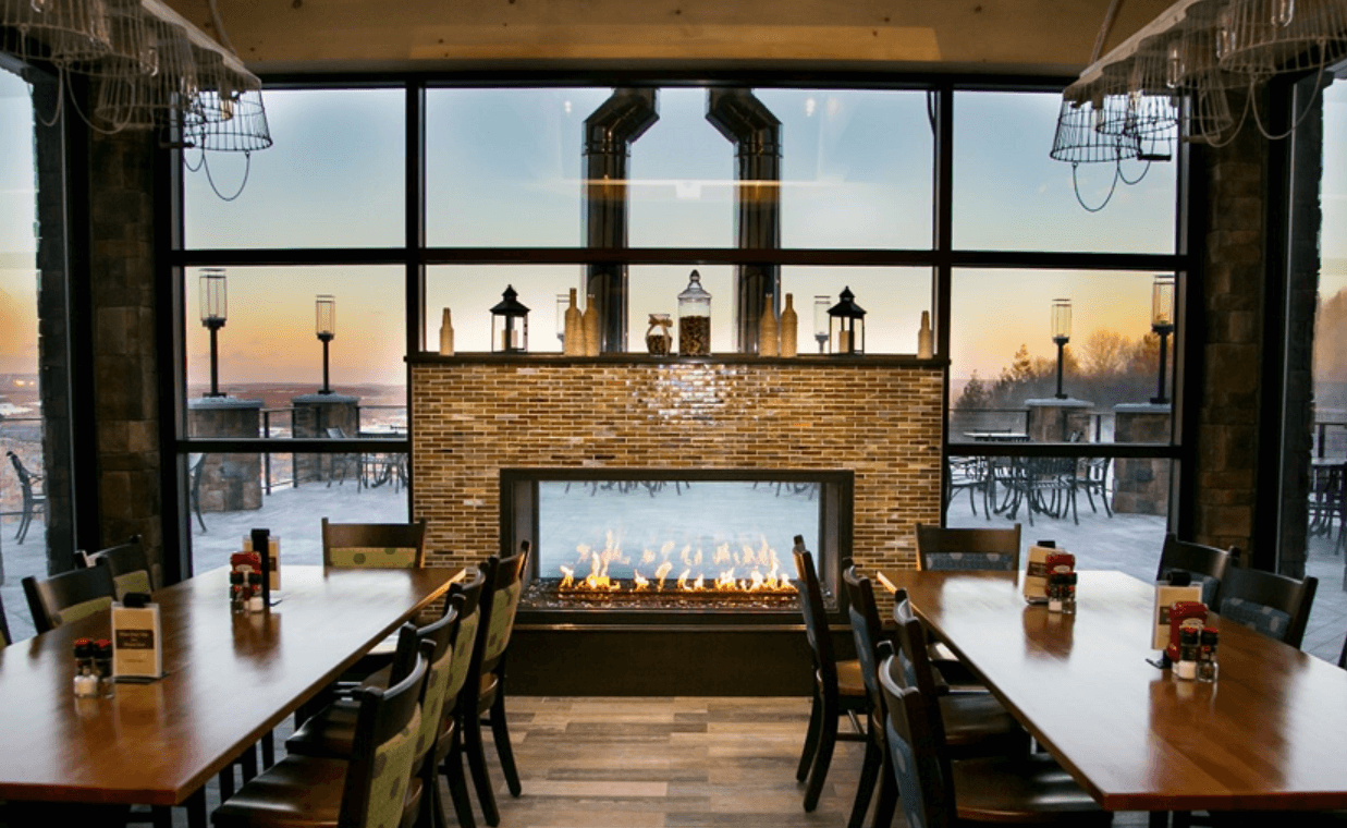 Indoor/outdoor gas fireplace in a restaurant
