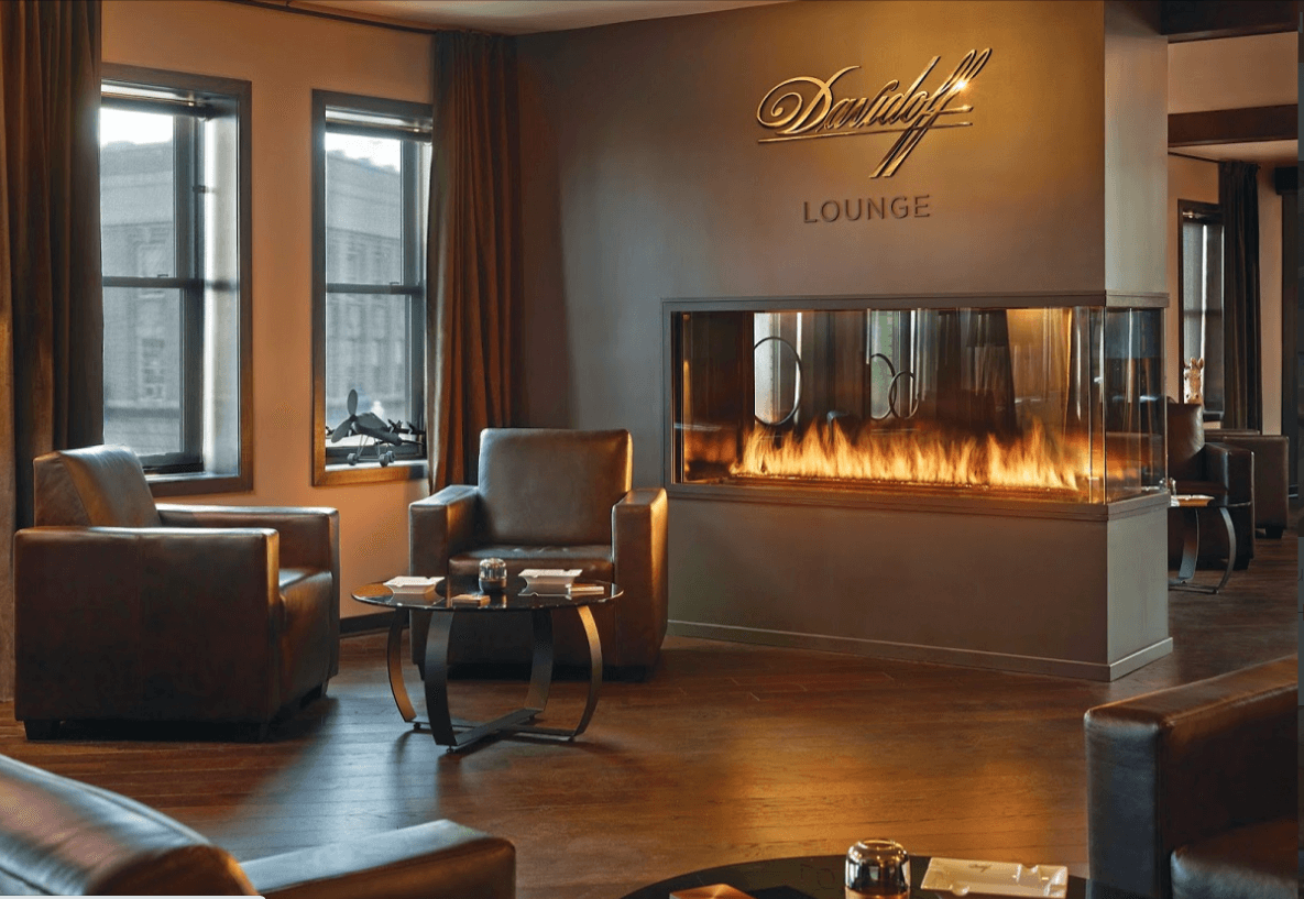 Peninsula gas fireplace in a hotel lobby