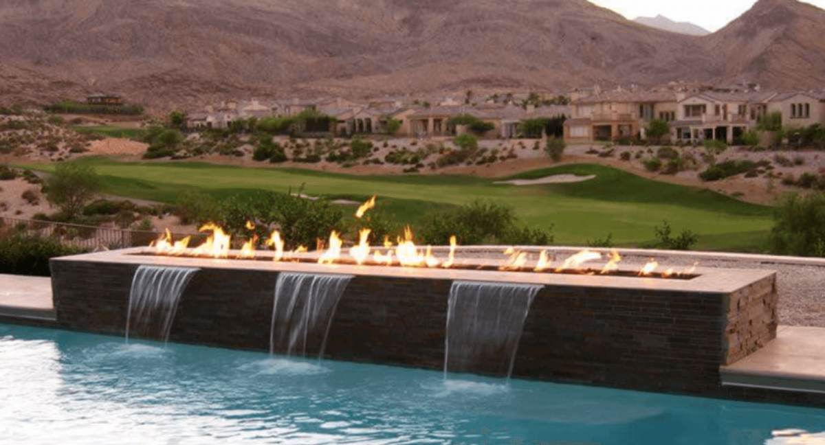 10 Pool Fire Pit and Fireplace Designs Your Guests Will Envy
