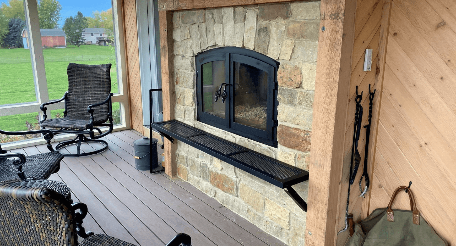 Farm Style Screened in Deck with a Fireplace