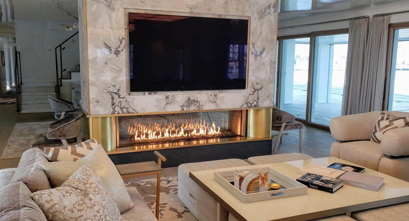gold and marble surround fireplace