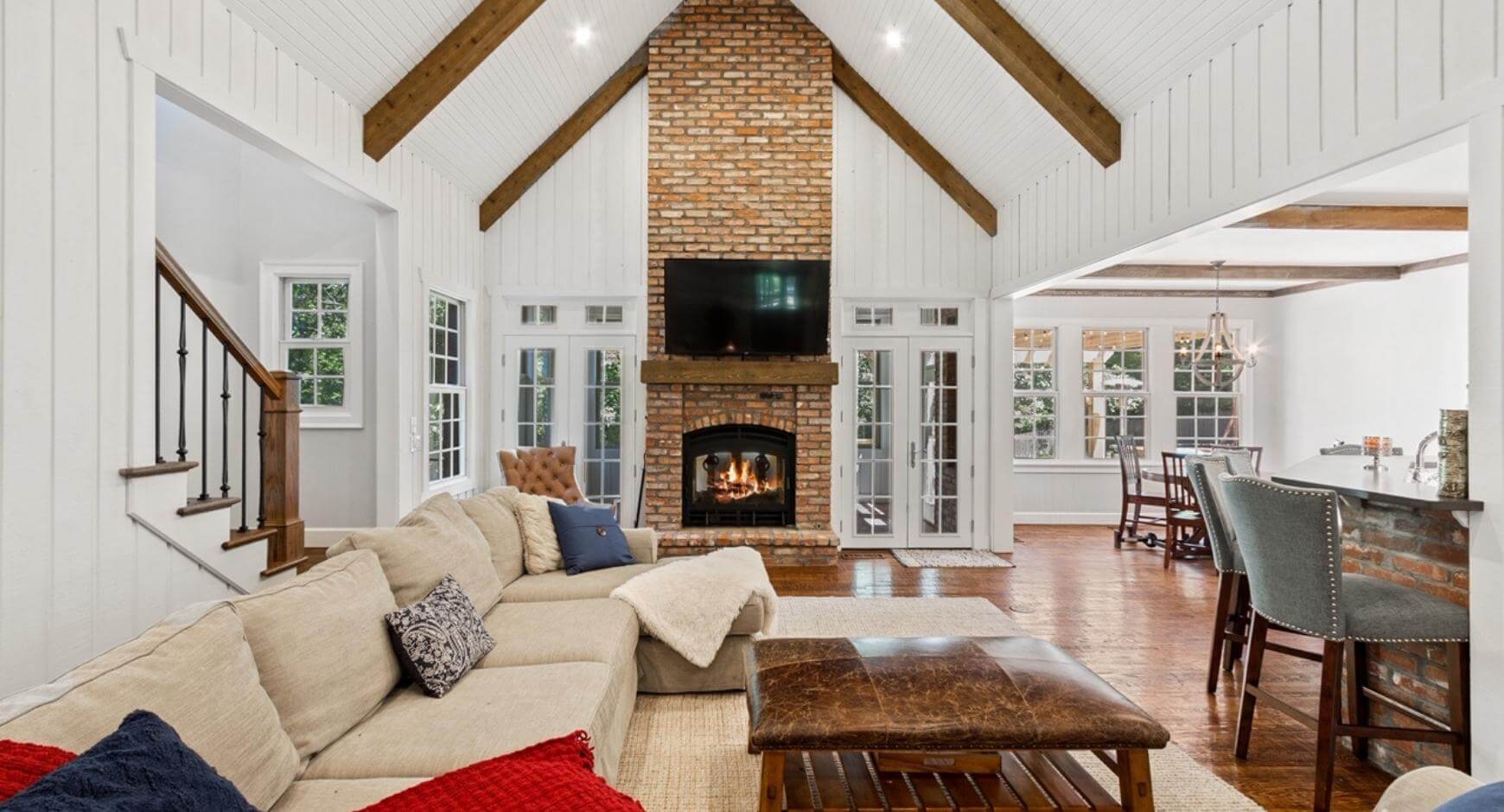 tall brick fireplace in white wall