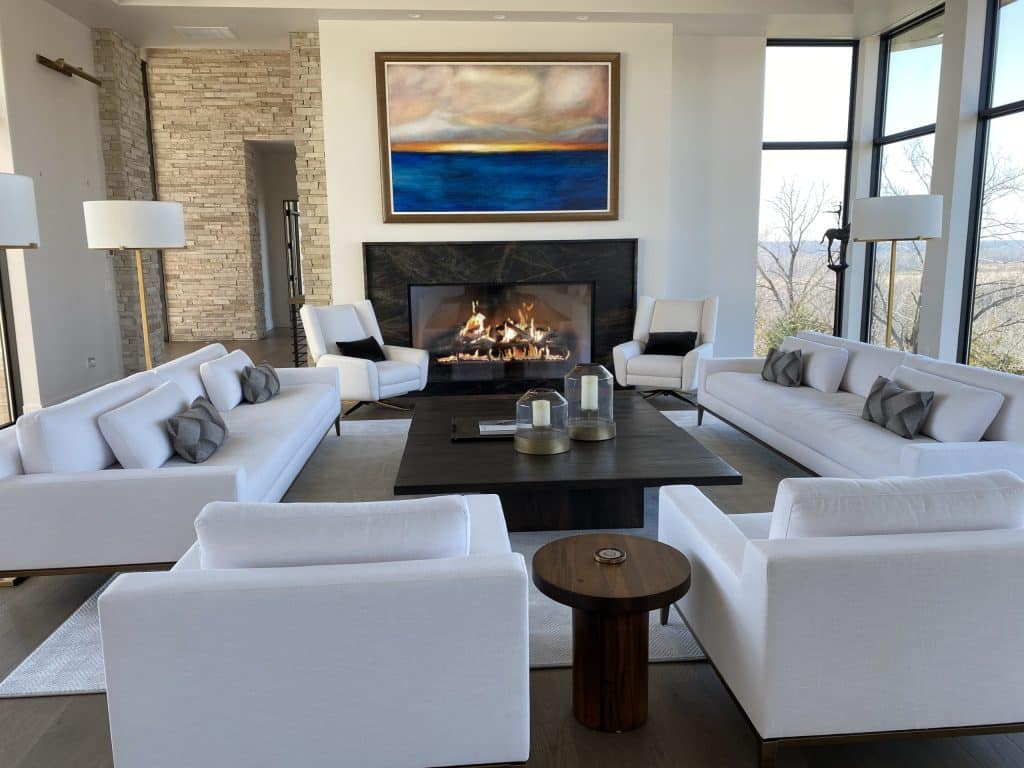 gas fireplace with logs in contemporary living room