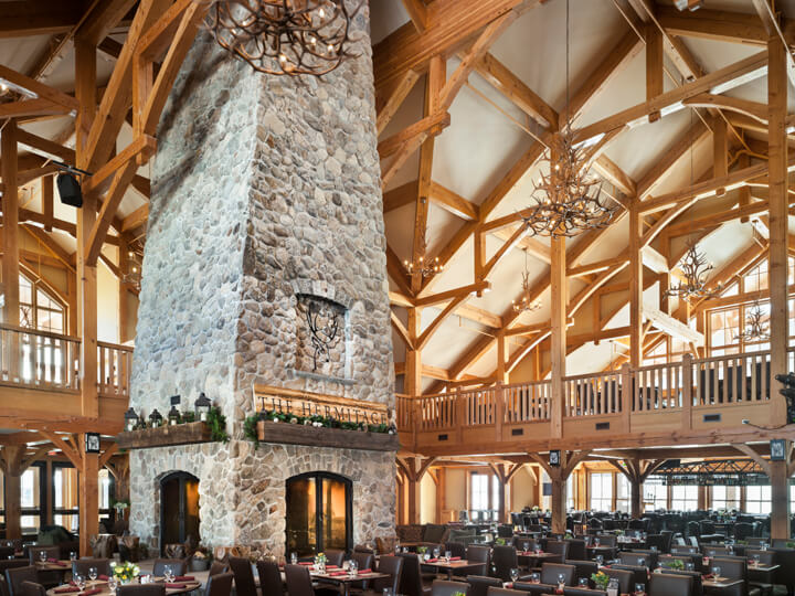 Central stone pillar with a four sided fireplace