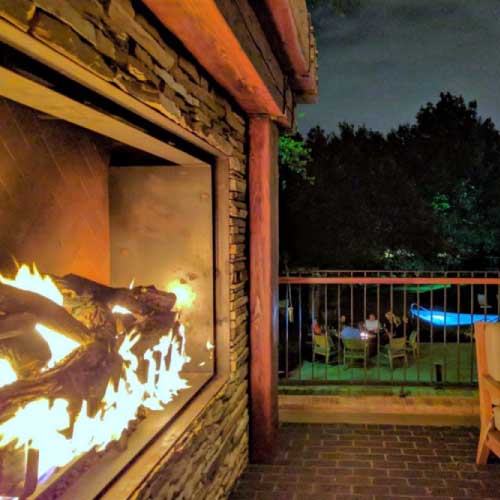 outdoor fireplace with logs