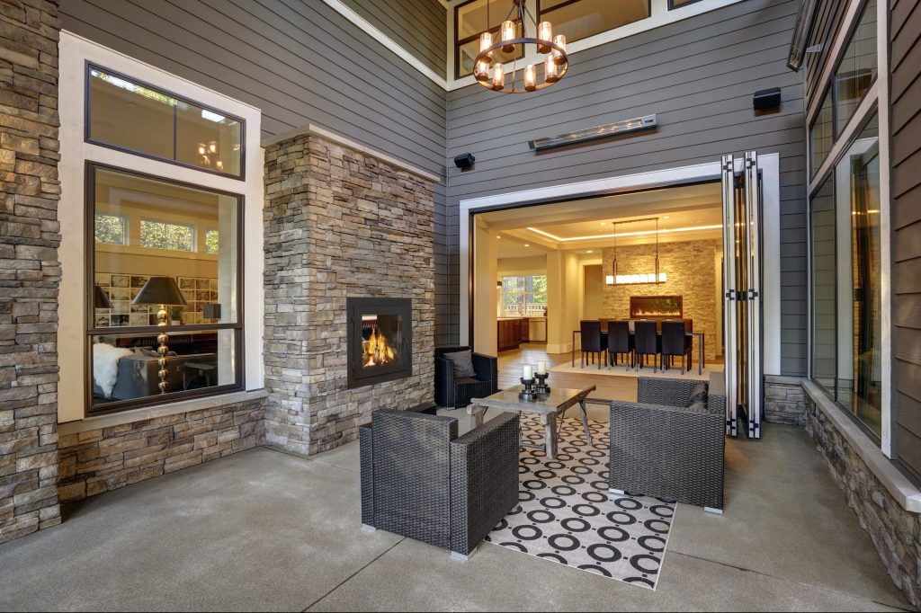 contemporary wood-burning fireplace outdoors on a patio