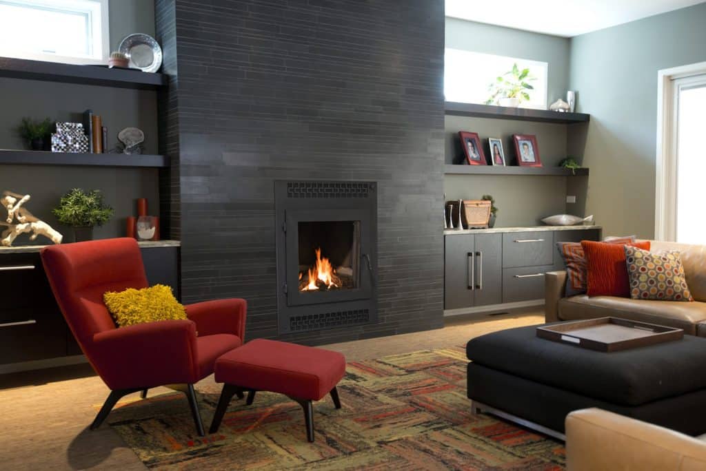 contemporary living room with front facing wood fireplace