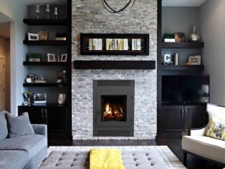 modern gray living room with light stacked stone fireplace