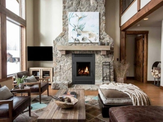 modern farmhouse cozy great room with large stone fireplace