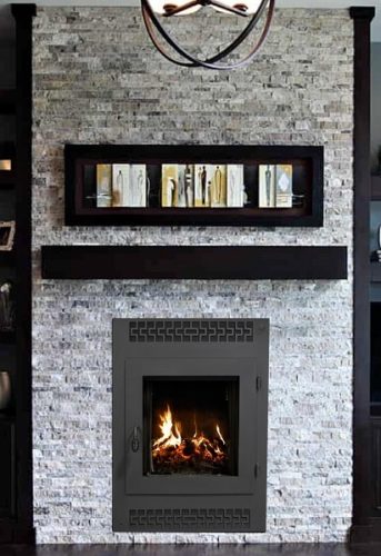 contemporary wood burning fireplace with large viewing area