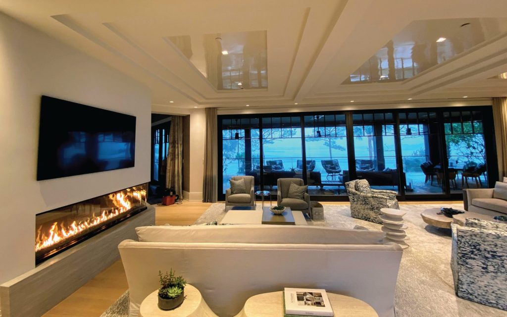 a unique custom made multi-view fireplace in a modern living room