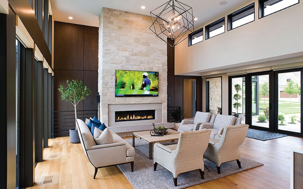 a modern linear fireplace in a contemporary cottage living room