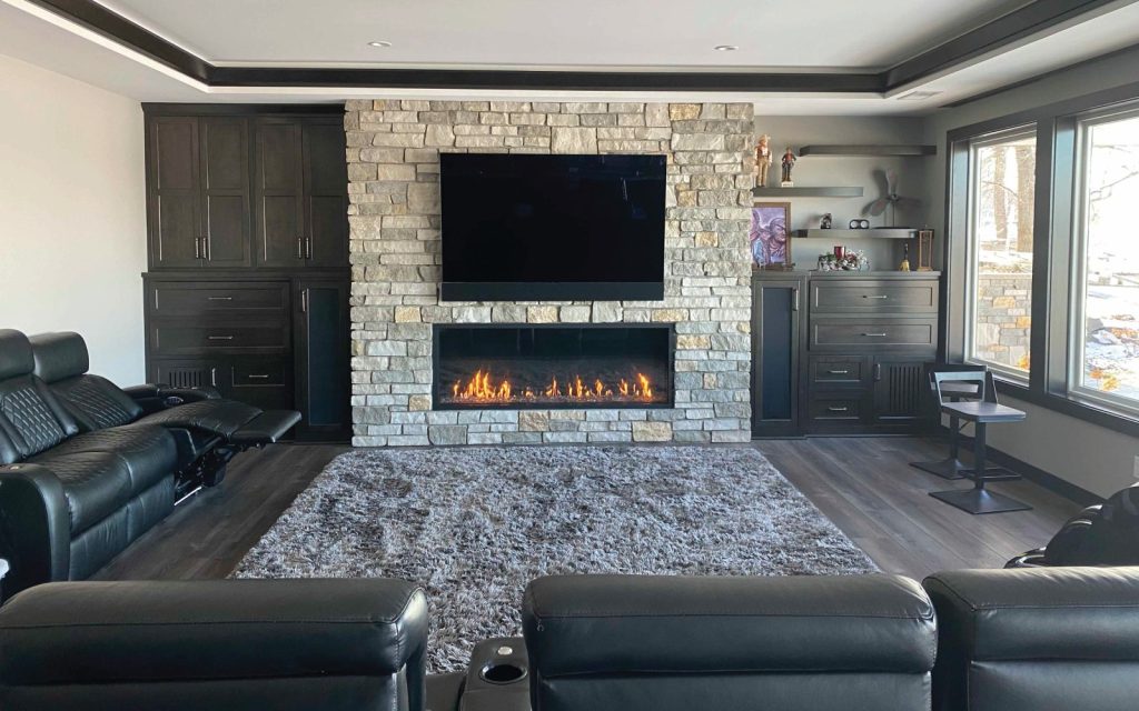 a linear gas fireplace with tv in a modern rustic living room