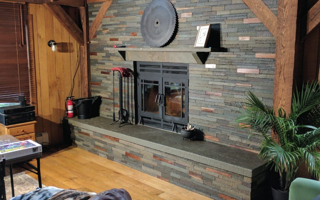 an acucraft fireplace with a contemporary stone finish