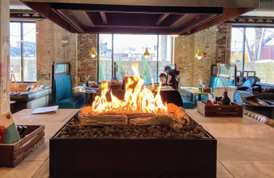 indoor fire pit with gas logs for urban restaurant