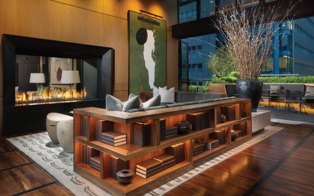 a see thru gas fireplace in a contemporary hotel lounge