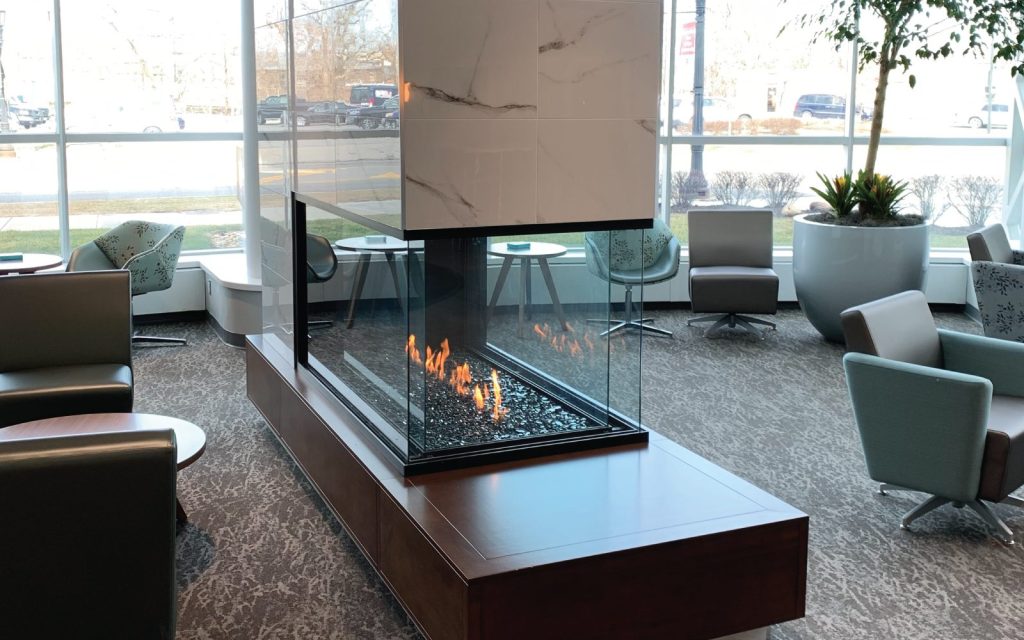 3 sided multi view gas fireplace in contemporary lounge