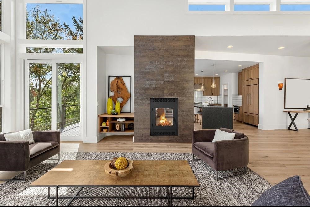 A contemporary wood-burning fireplace in a modern living room