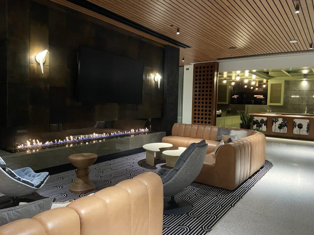 Acucraft Custom Front & Side Gas Fireplace with LED Lighting and Black Reflective Glass Media 