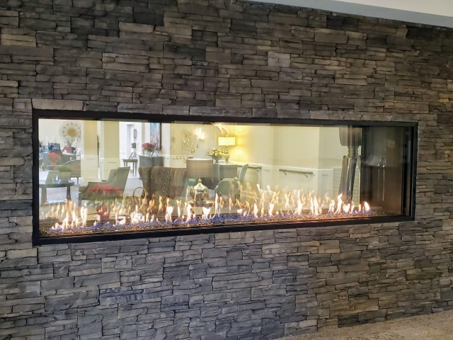 Acucraft Custom Linear See Through Gas Fireplace with Reflective Glass Media and Black Frame (2)